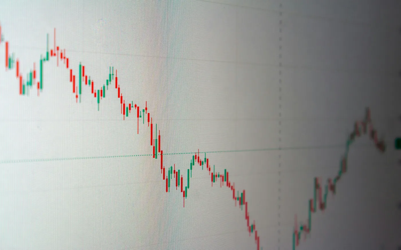 Stock market chart shows a downward trend. by Arturo Añez courtesy of Unsplash.