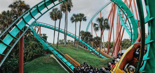 teal and orange space shuttle by Matt Bowden courtesy of Unsplash.