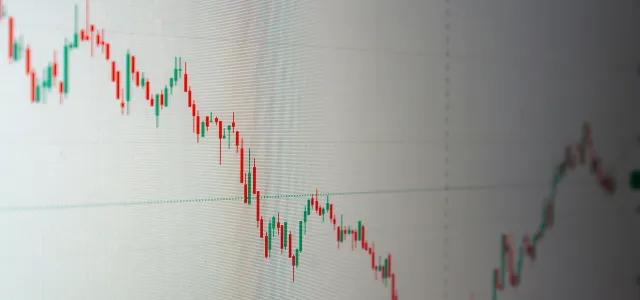 Stock market chart shows a downward trend. by Arturo Añez courtesy of Unsplash.